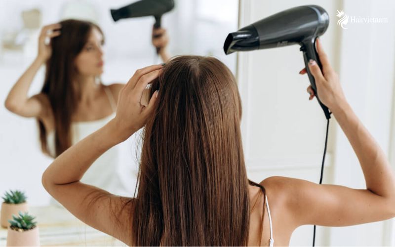  Is blow drying hair better when wet or damp?