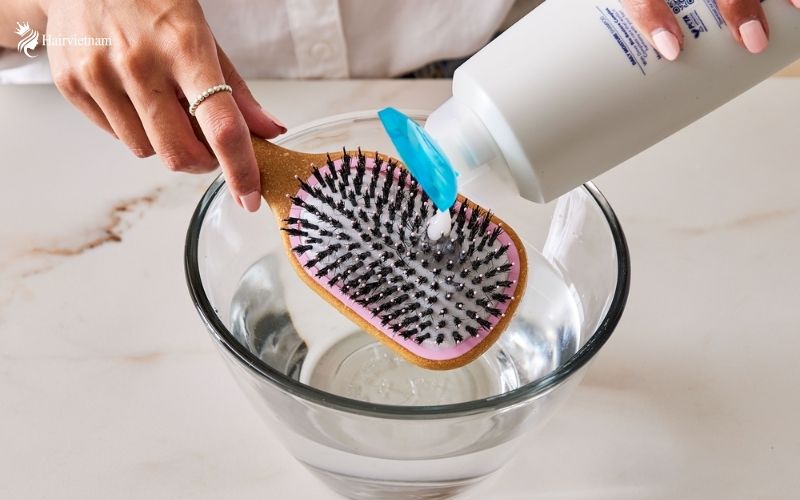 How do you wash hairbrushes with fake bristles and handles?